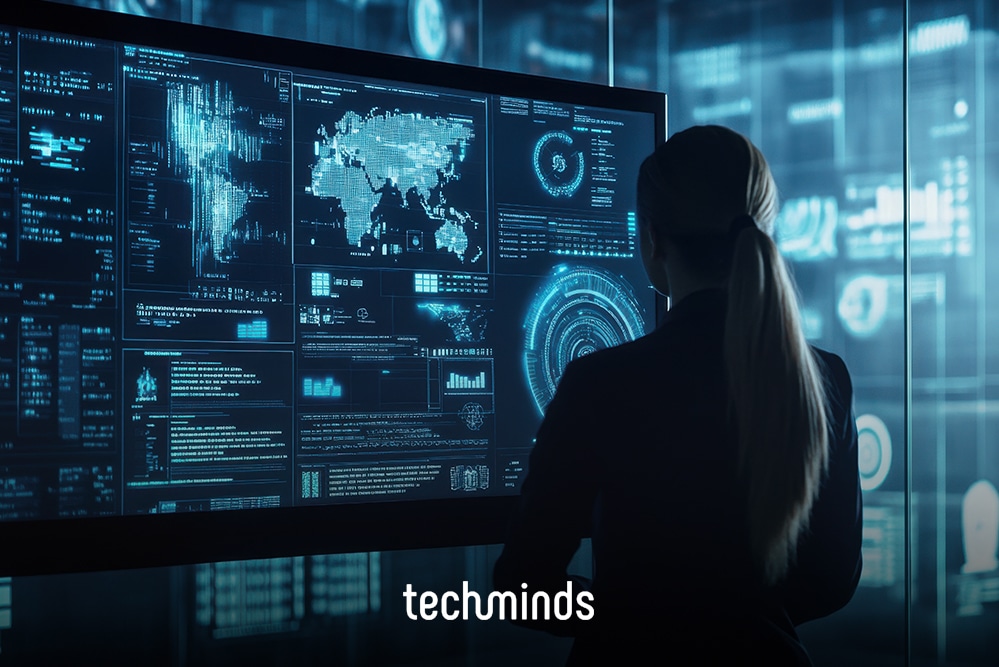 Softwarearchitekt vor großen Bildschirmen mit Systemdaten, Jobprofil Softwarearchitekt