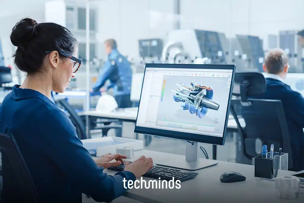 CAD-Konstrukteurin arbeitet am 3D-Modell eines Motors, Jobprofil CAD-Konstrukteur